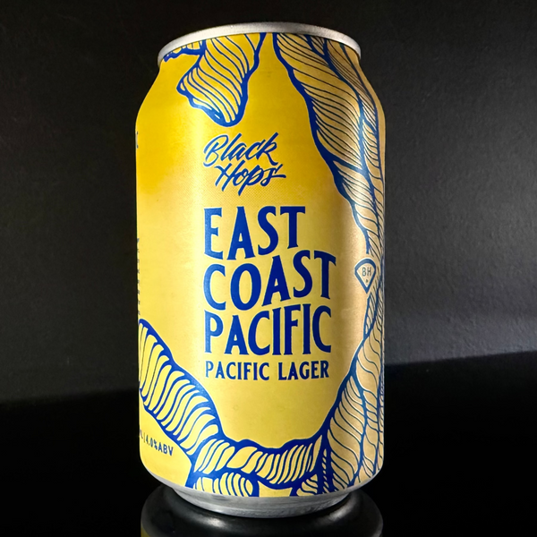 A yellow and blue designed can of Black Hops, East Coast Pacific: Pacific Lager on a black background from My Beer Dealer.